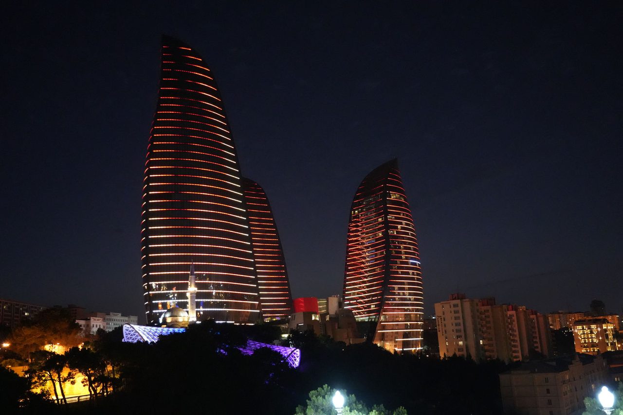 The iconic Flame Towers lit up at night