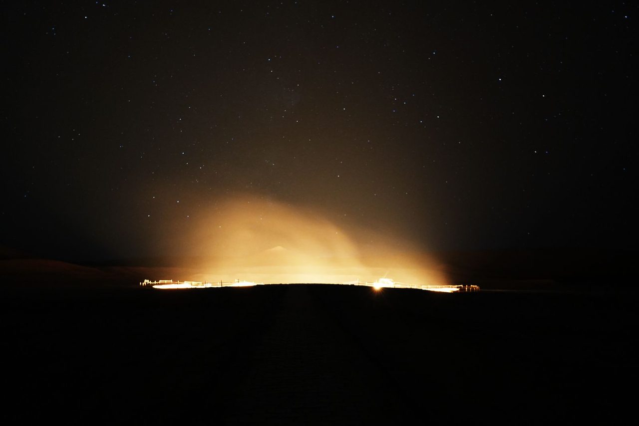 Glow from Darvaza Gas Crater and Starry Sky