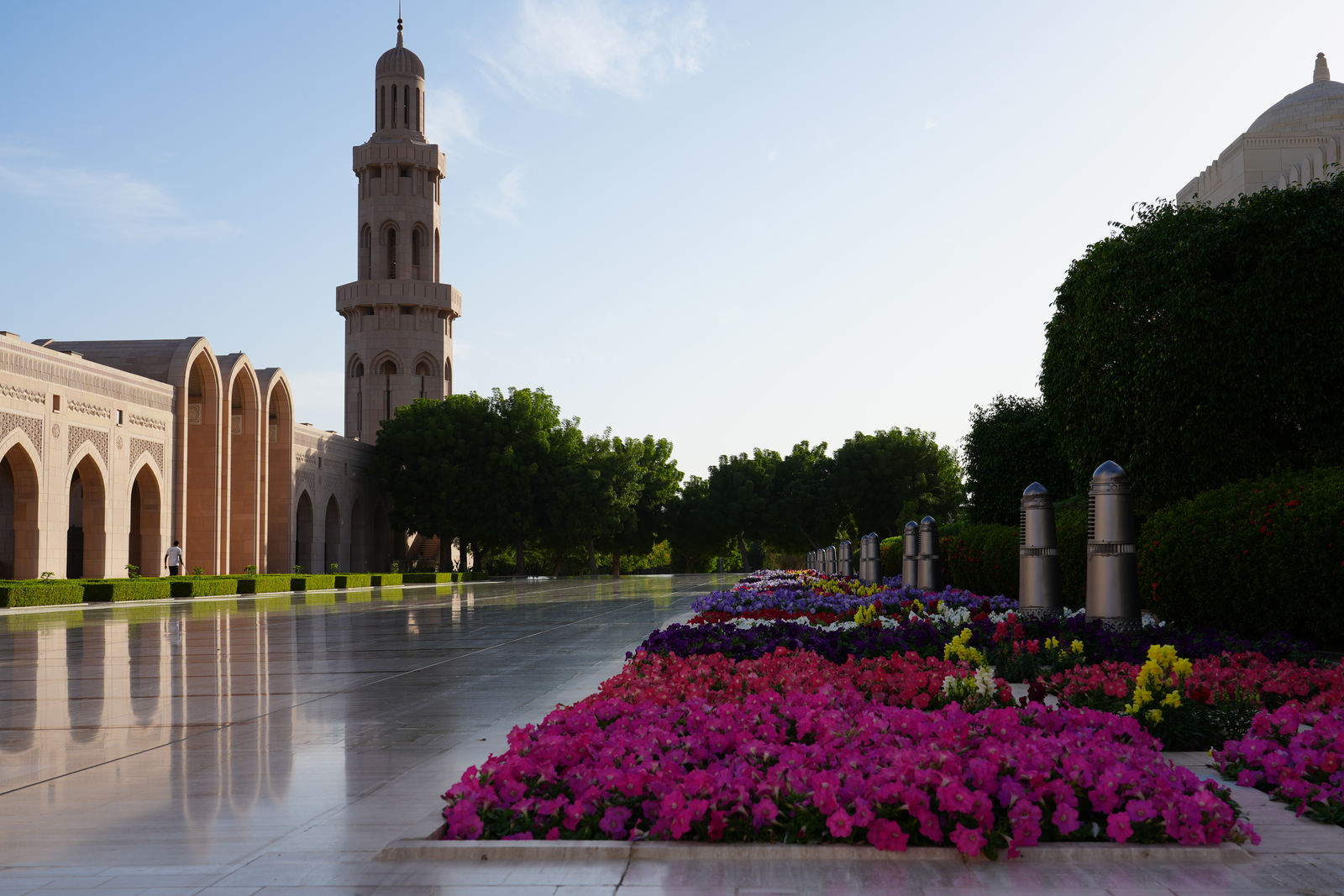 Minaret and Vibrant Flower Garden