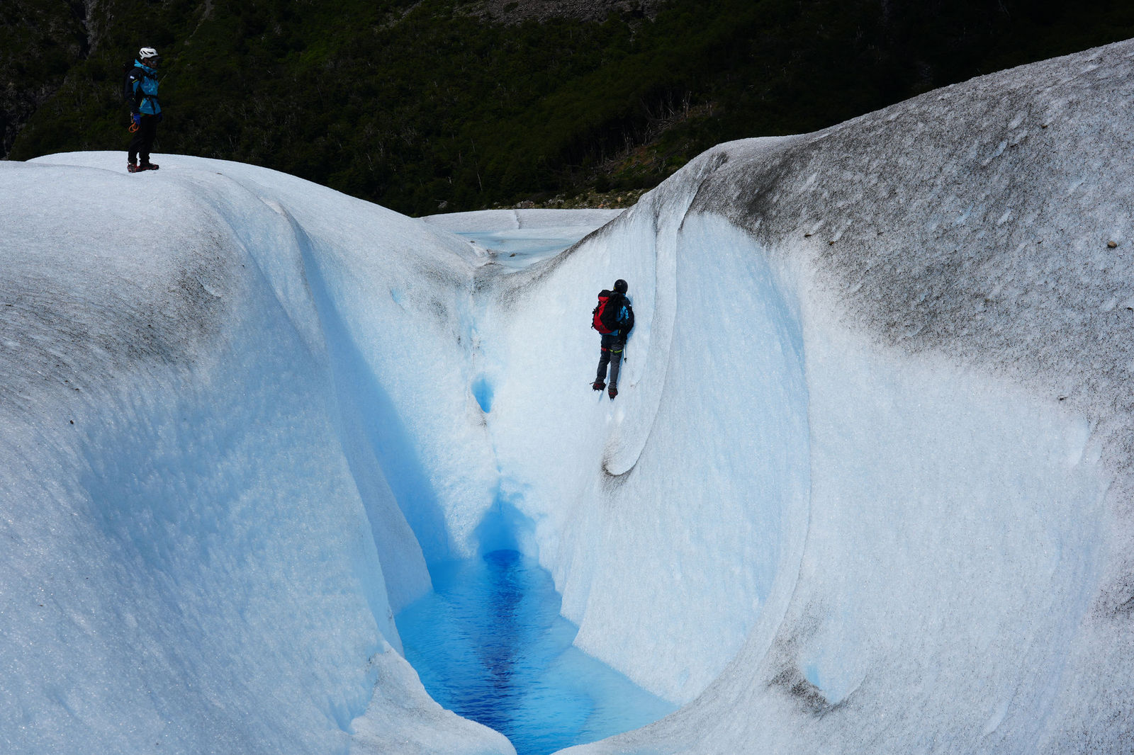 A Person by the Glacier Wall