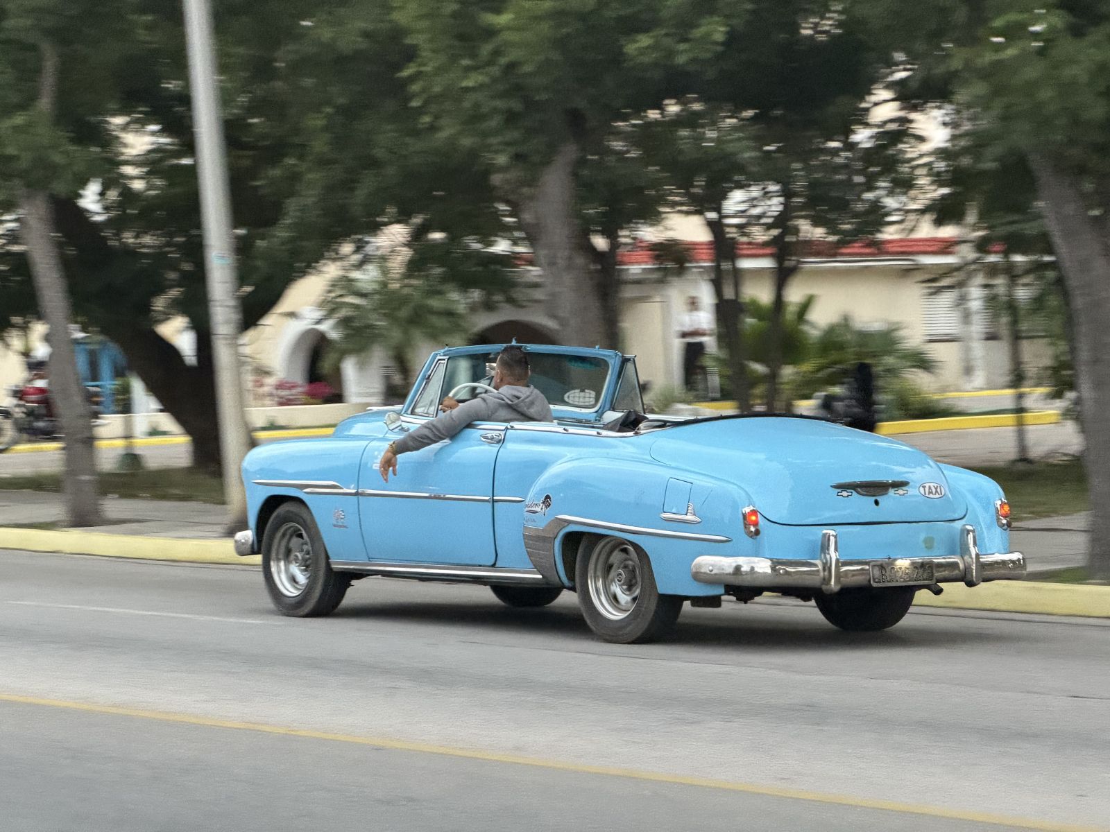 A Classic Blue Convertible Taxi