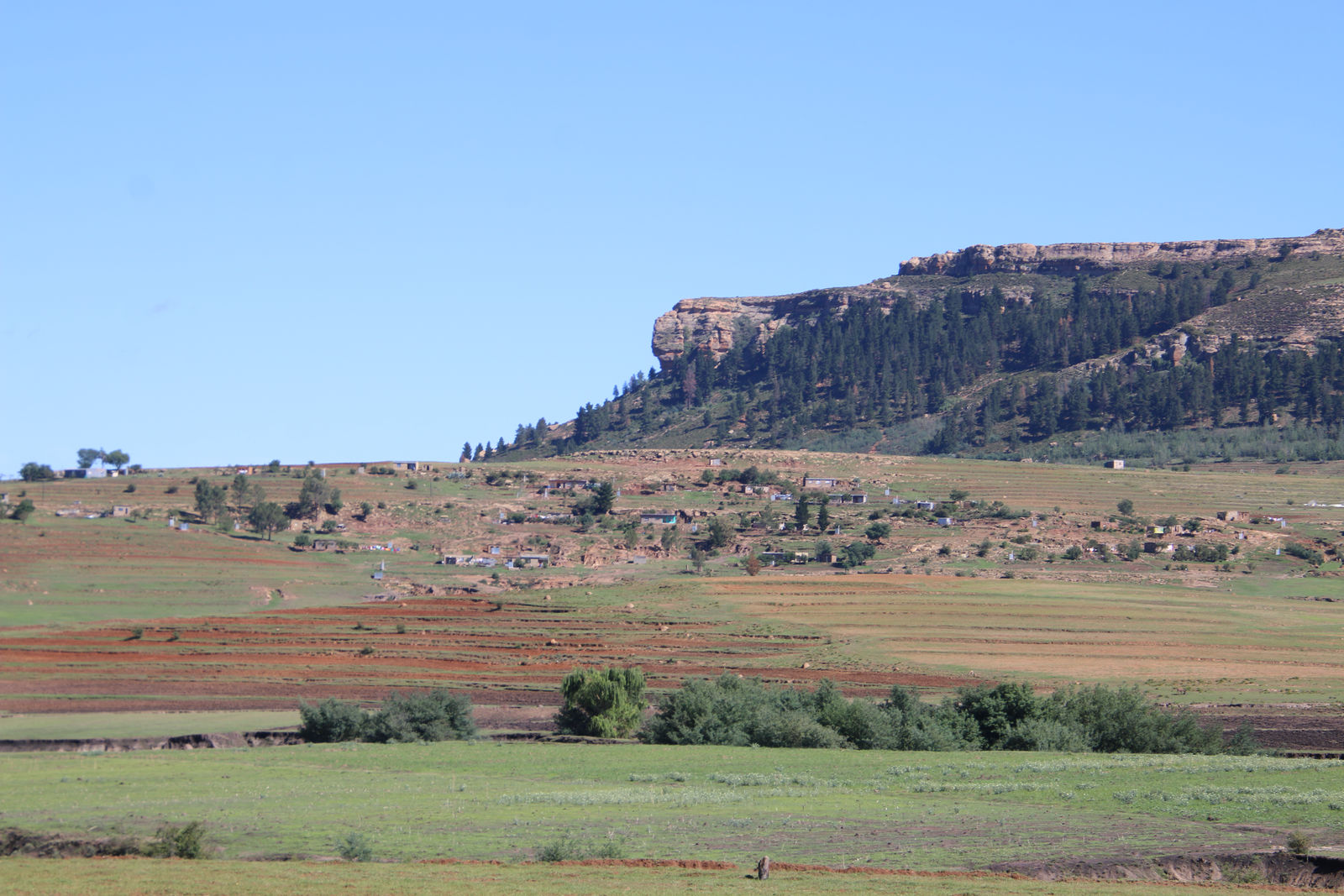 A Village Below The Cliff