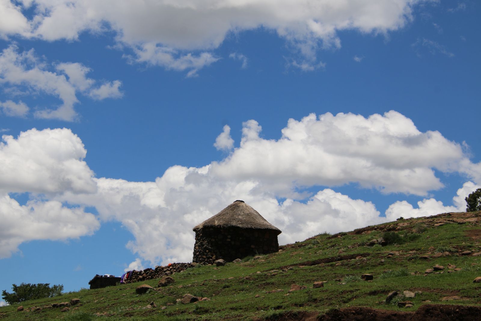 A Rondavel Hut And Blue Sky